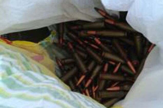 В Киеве член 'Правого сектора' пытался забрать из своего тайника гранатомет гранаты и сотни патронов