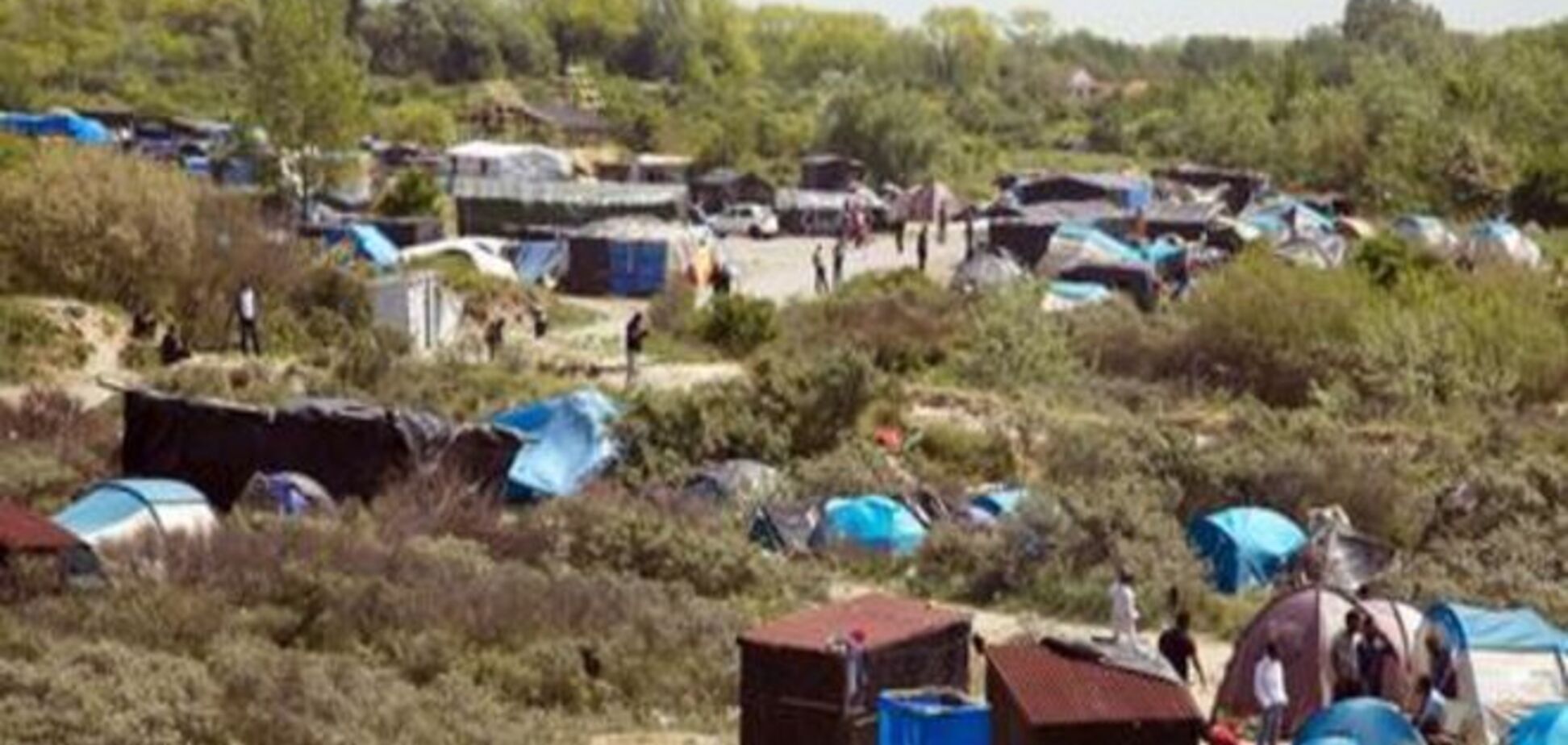 Из Судана в Великобританию: 'джунгли' беженцев во Франции