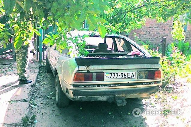 Разрушенные дома и 'убитые' автомобили. Обстрел Верхнеторецкого: эксклюзивные фото