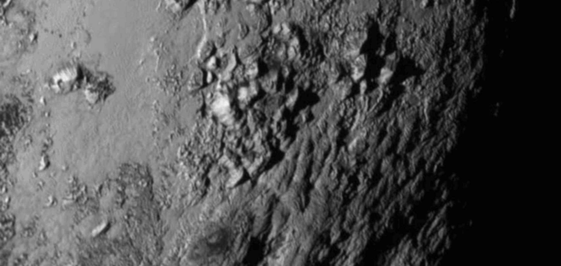 Появился первый снимок поверхности Плутона: фотофакт