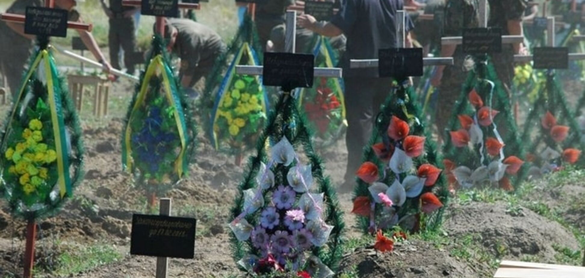 57 украинских воинов похоронили, так и не опознав: фото- и видеорепортаж из-под Запорожья