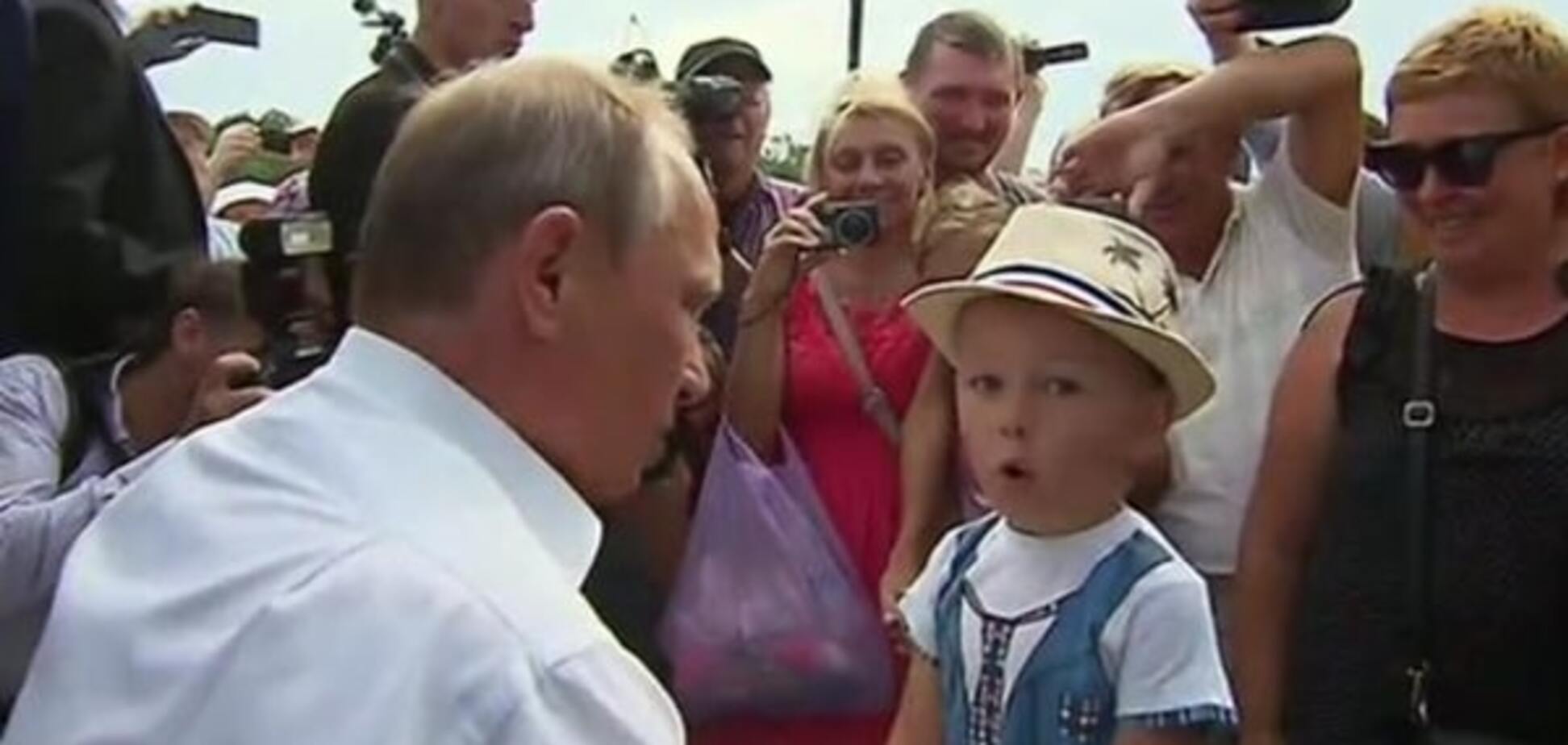 Путин потискал в Крыму очередного мальчика: фотофакт
