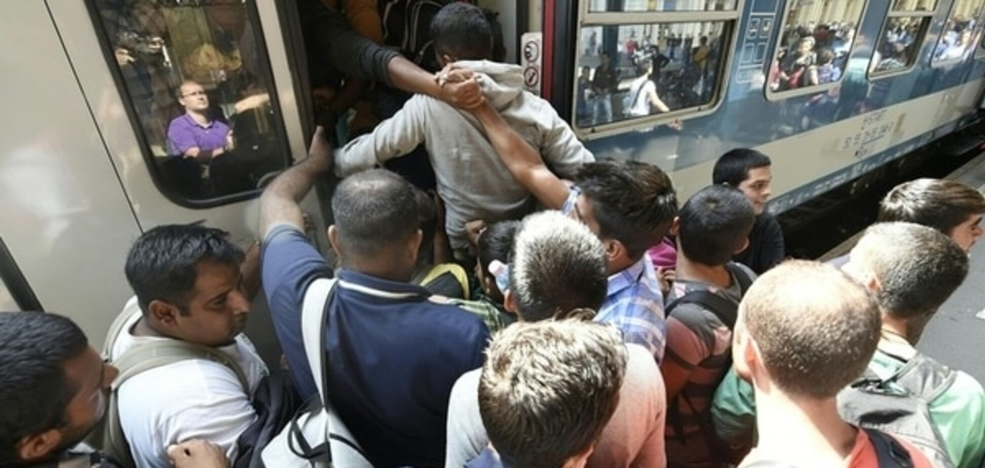 Кризис мигрантов в ЕС: фоторепортаж из бунтующих городов