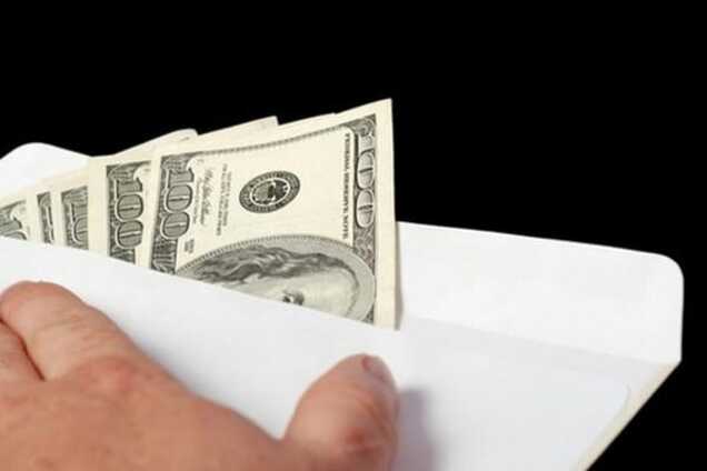 В Днепропетровске прокурора поймали на взятке в тысячу долларов