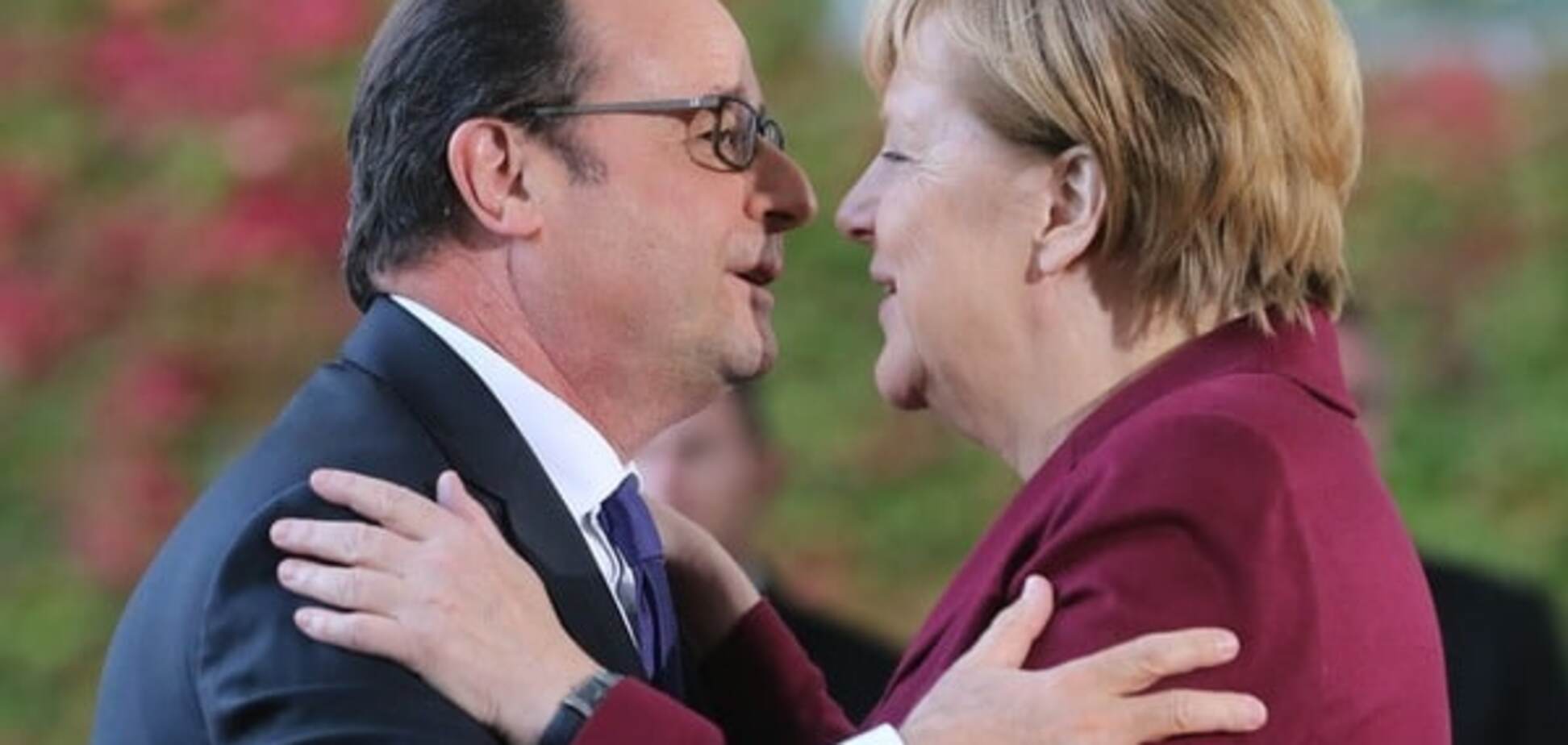 Президент Франції Франсуа Олланд і канцлер ФРН Ангела Меркель
