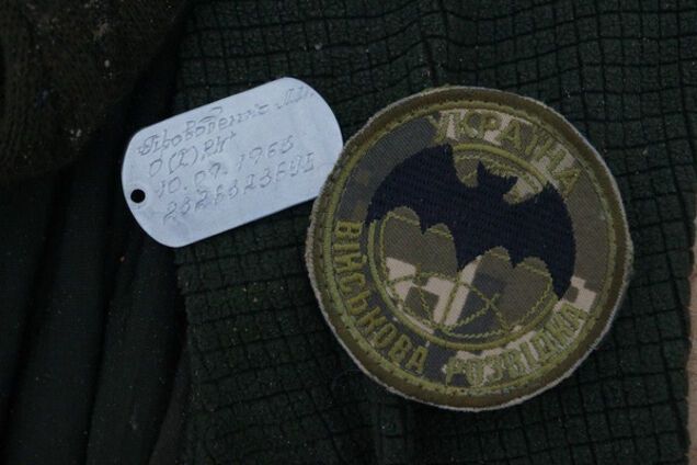 Військовий жетон і шеврон