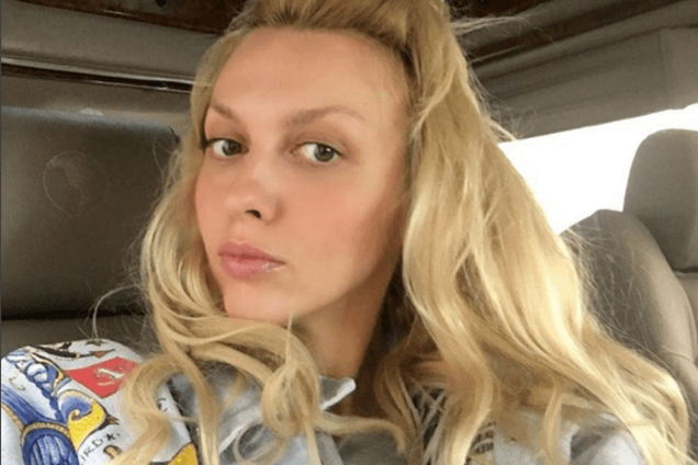 Оля Полякова