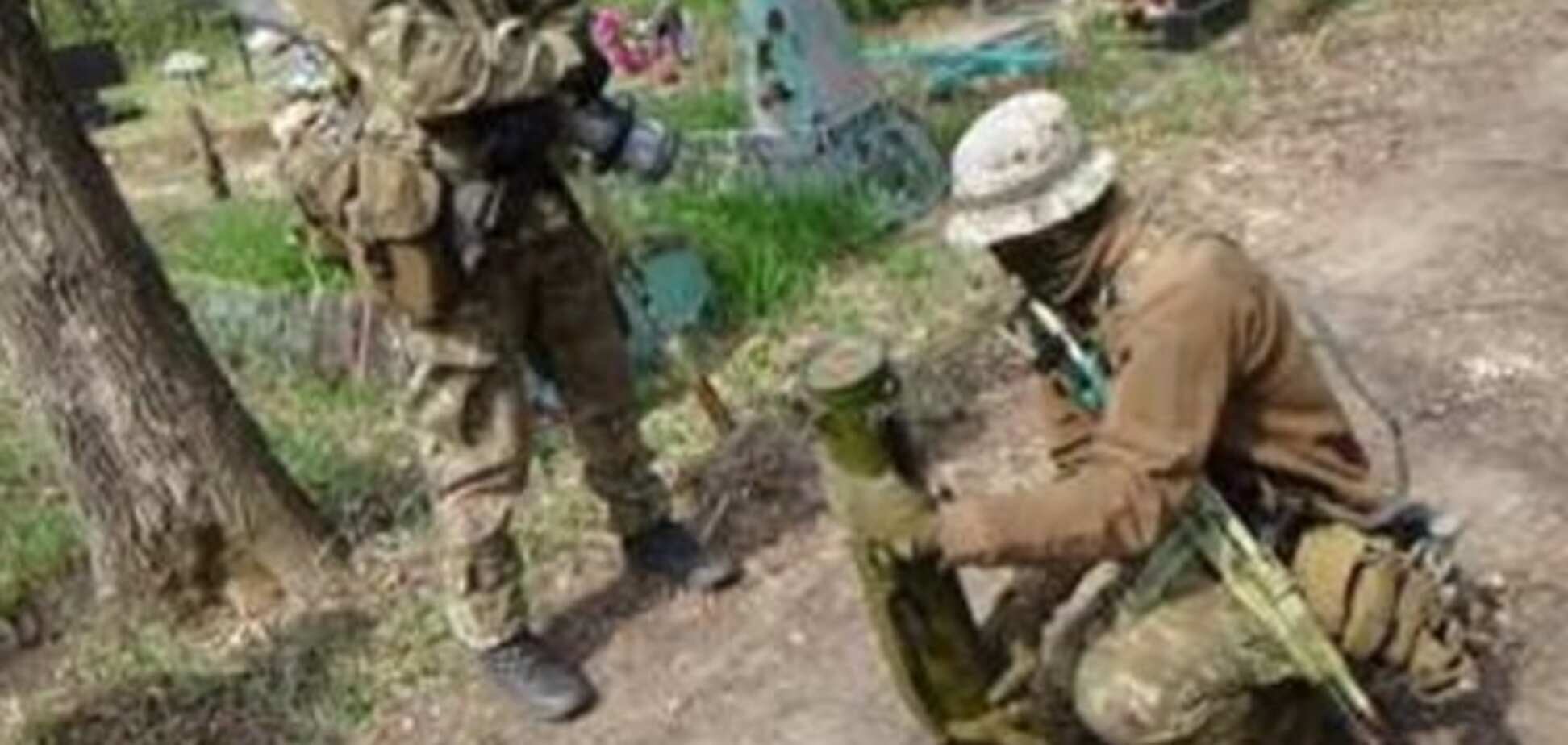 Тайник с оружием на кладбище в Попасной