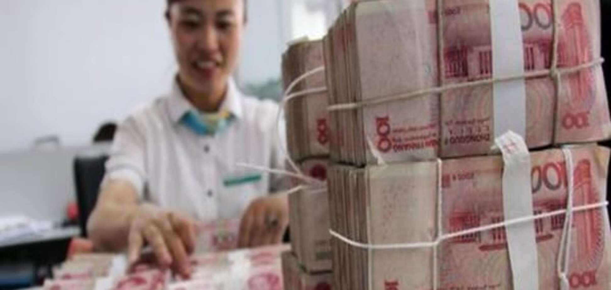 Китайський юань упав до долара США до п'ятирічного мінімуму