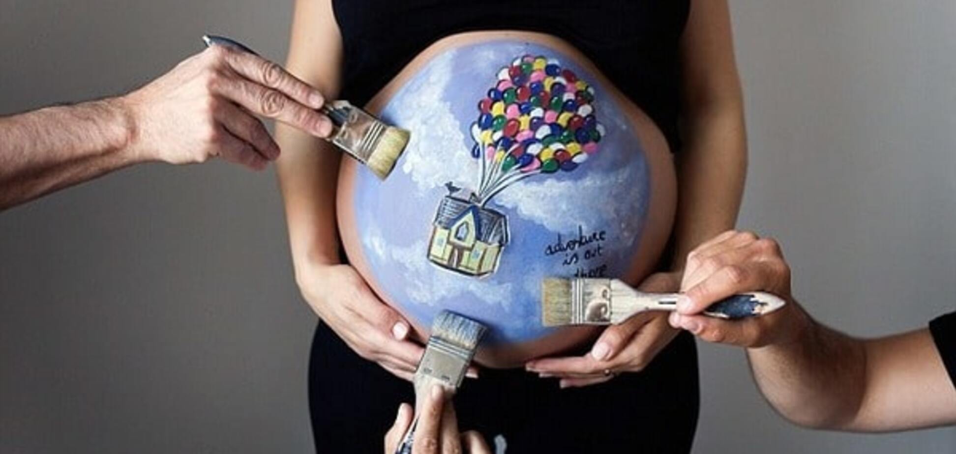Фатима Каррион Альфонсо рисует на животах беременных