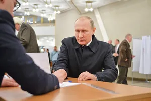 Путін вибори голосує