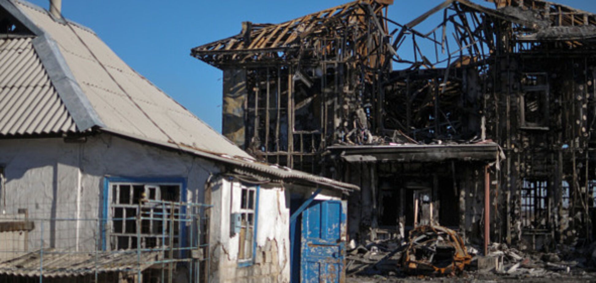 Разрушенный дом в зоне АТО