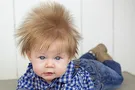 малыш с длинными волосами