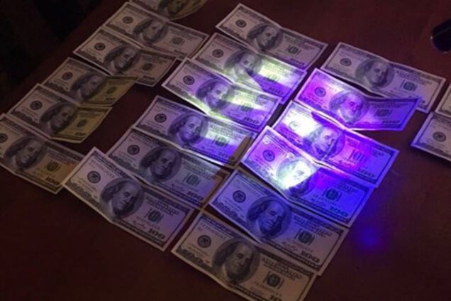 Чиновник получил взятку за землю