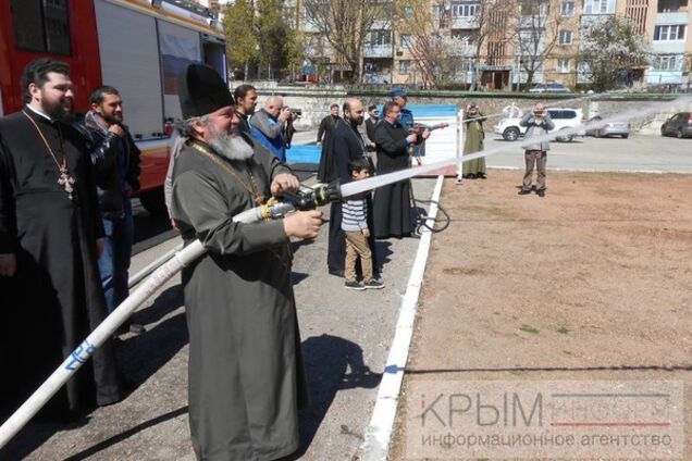 Священники