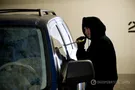 В Киеве у бывшего сотрудника МВД угнали джип с оружием и документами