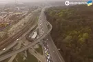 Как горе-водители заблокировали трассу в Киеве: видео коллапса с дрона