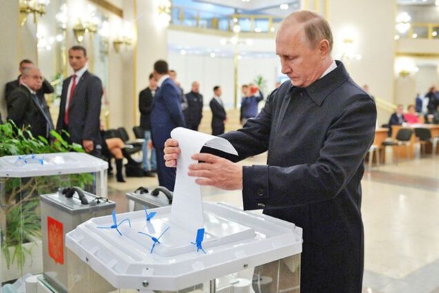 путин голосует выборы