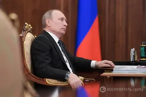 Путин
