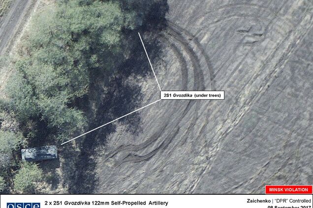 Прятали в кустах: беспилотник ОБСЕ 'спалил' запрещенную технику террористов 'ДНР'