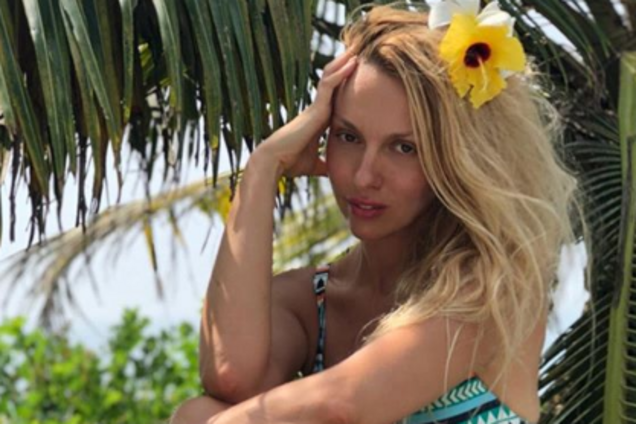 Оля Полякова