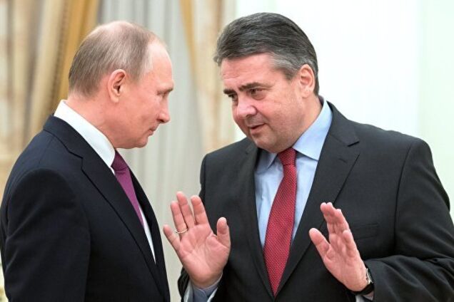 Президент РФ Владимир Путин и экс-министр иностранных дел Германии Зигмар Габриэль