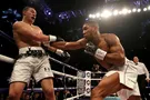 Джошуа в тяжелом бою завоевал четыре чемпионских пояса