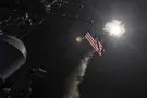 Жги: в Крыму отомстили портретам Трампа, Макрона и Мэй за Сирию