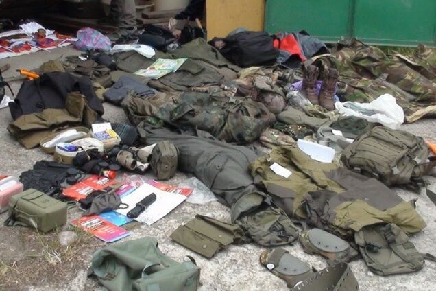 У Запоріжжі впіймали російських шпигунів з портретом Путіна. Відеофакт