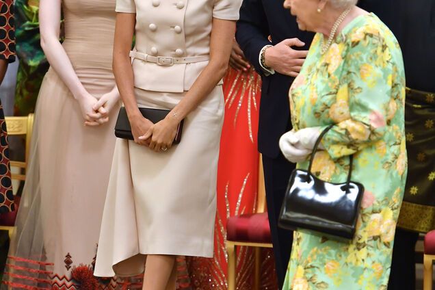 Почему Меган Маркл часто выбирает розовый цвет