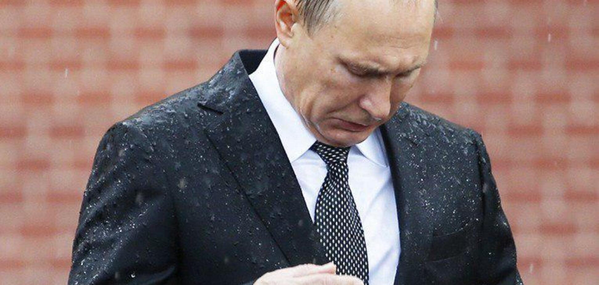 Путін промок