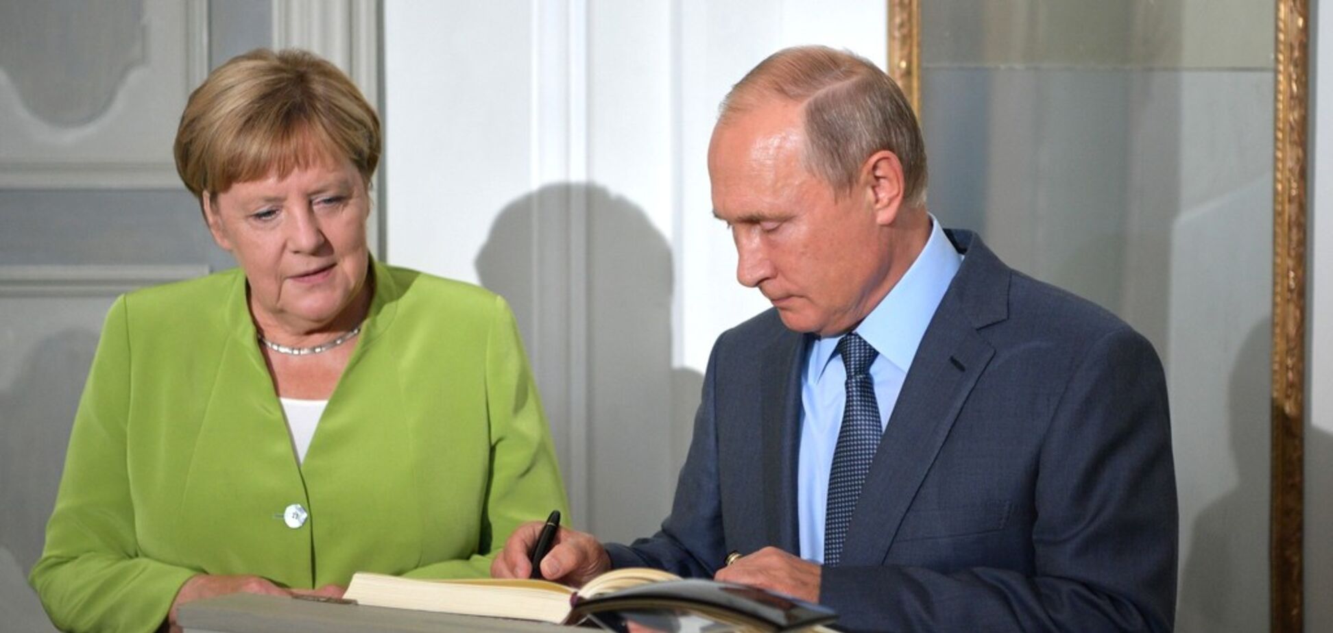 Путін поговорив із Меркель про Україну та ліквідацію Захарченка: що відомо