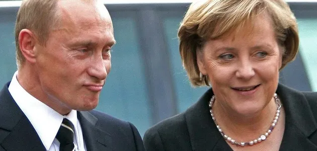 Путін і Меркель