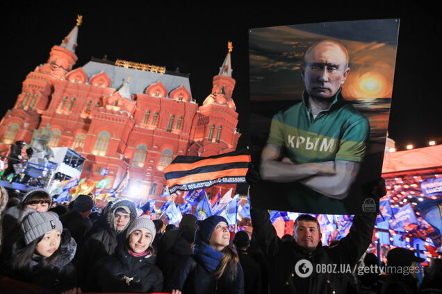 Россияне ездят с флагами Украины и даже с портретами Бандеры