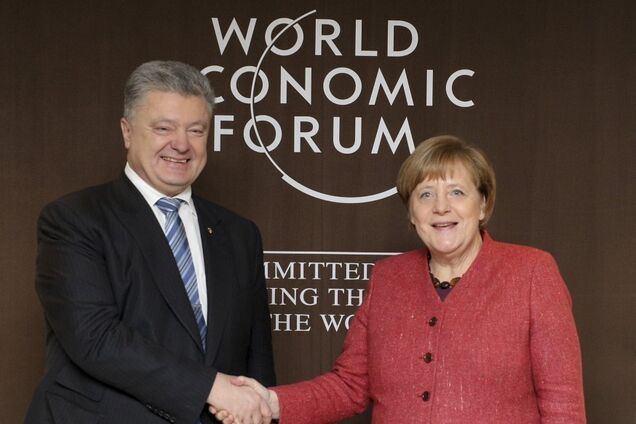 Про вибори і Донбас: Порошенко поговорив із Меркель у Давосі