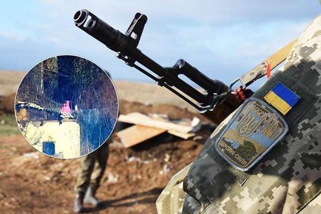"Прячется за детской спиной": на позиции снайпера "ДНР" заметили девочку. Фотофакт