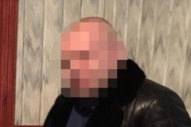 Требовал за работу тысячи долларов: в Киеве на взятке задержали начальника полиции