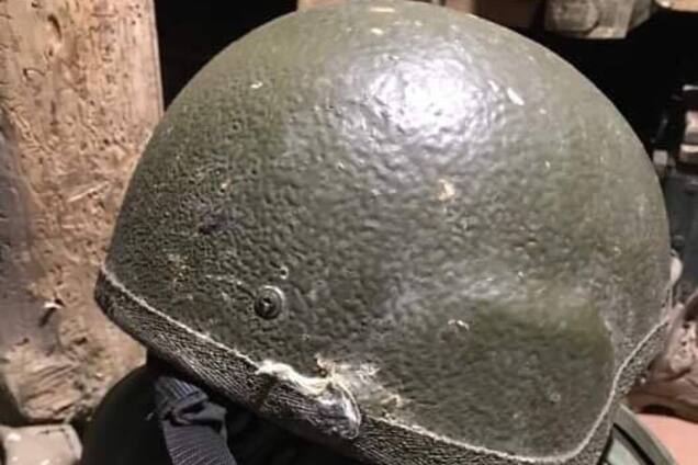 Каска, в которую попала пуля