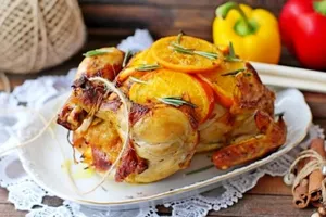 Курка, фарширована апельсинами - покроковий рецепт Курка, фарширована апельсинами - покроковий рецепт
