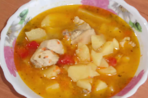 Тушкована курка з картоплею по-селянськи