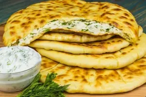 Хичіни з сиром і зеленню - покроковий рецепт Хичіни з сиром і зеленню - покроковий рецепт