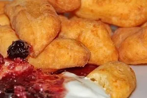 Баурсаки зі сметаною - покроковий рецепт Баурсаки зі сметаною - покроковий рецепт