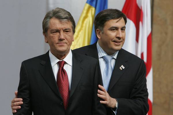 Путин советует Ющенко и Саакашвили поужинать без галстуков