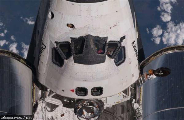 Астронавты Discovery приступили к работе в открытом космосе
