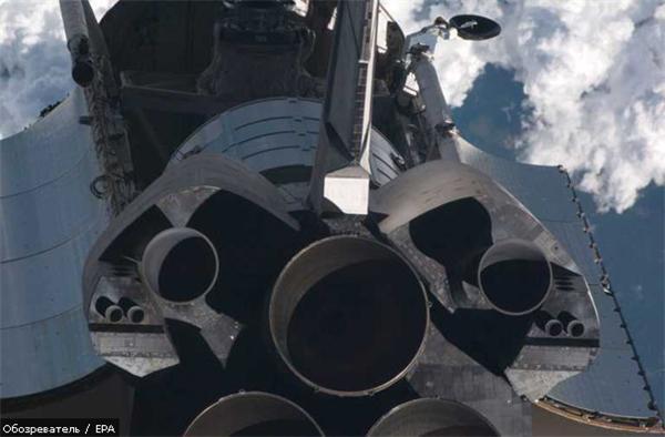 Астронавты Discovery приступили к работе в открытом космосе