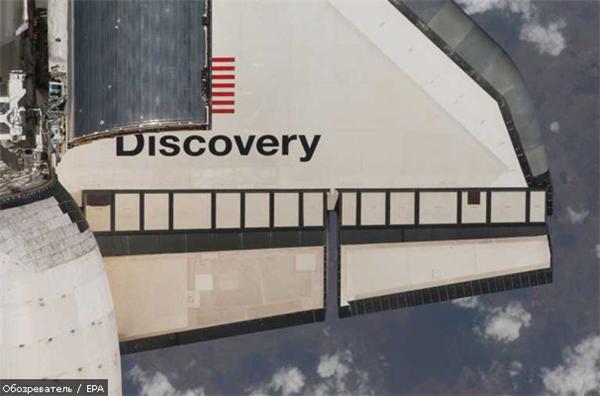 Астронавты Discovery приступили к работе в открытом космосе