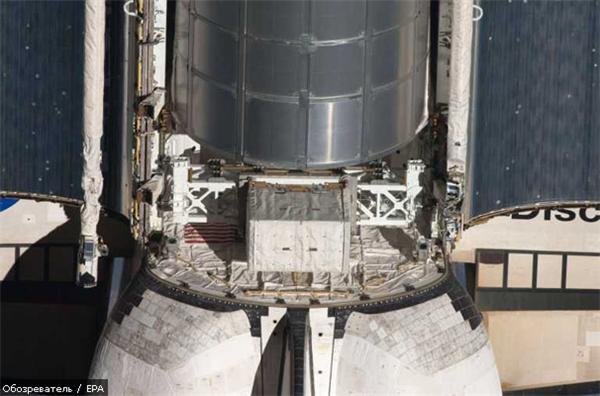 Астронавты Discovery приступили к работе в открытом космосе