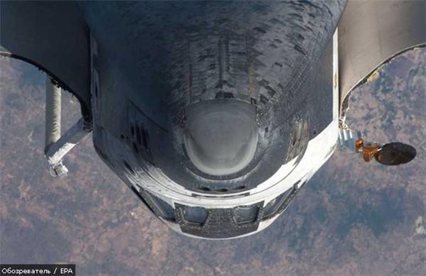 Астронавты Discovery приступили к работе в открытом космосе