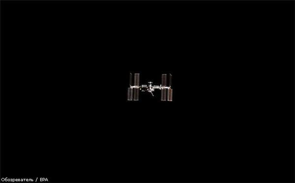 Астронавты Discovery приступили к работе в открытом космосе