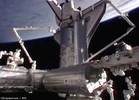 Астронавты Discovery приступили к работе в открытом космосе